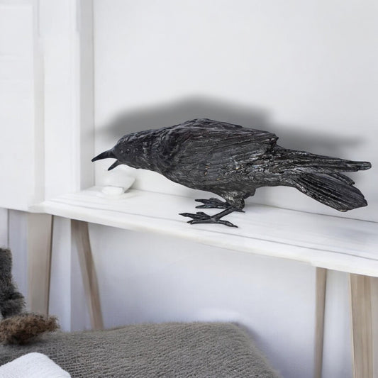 Raven Looking for Food Bronze State - Size: 24"L x 6"W x 12"H.