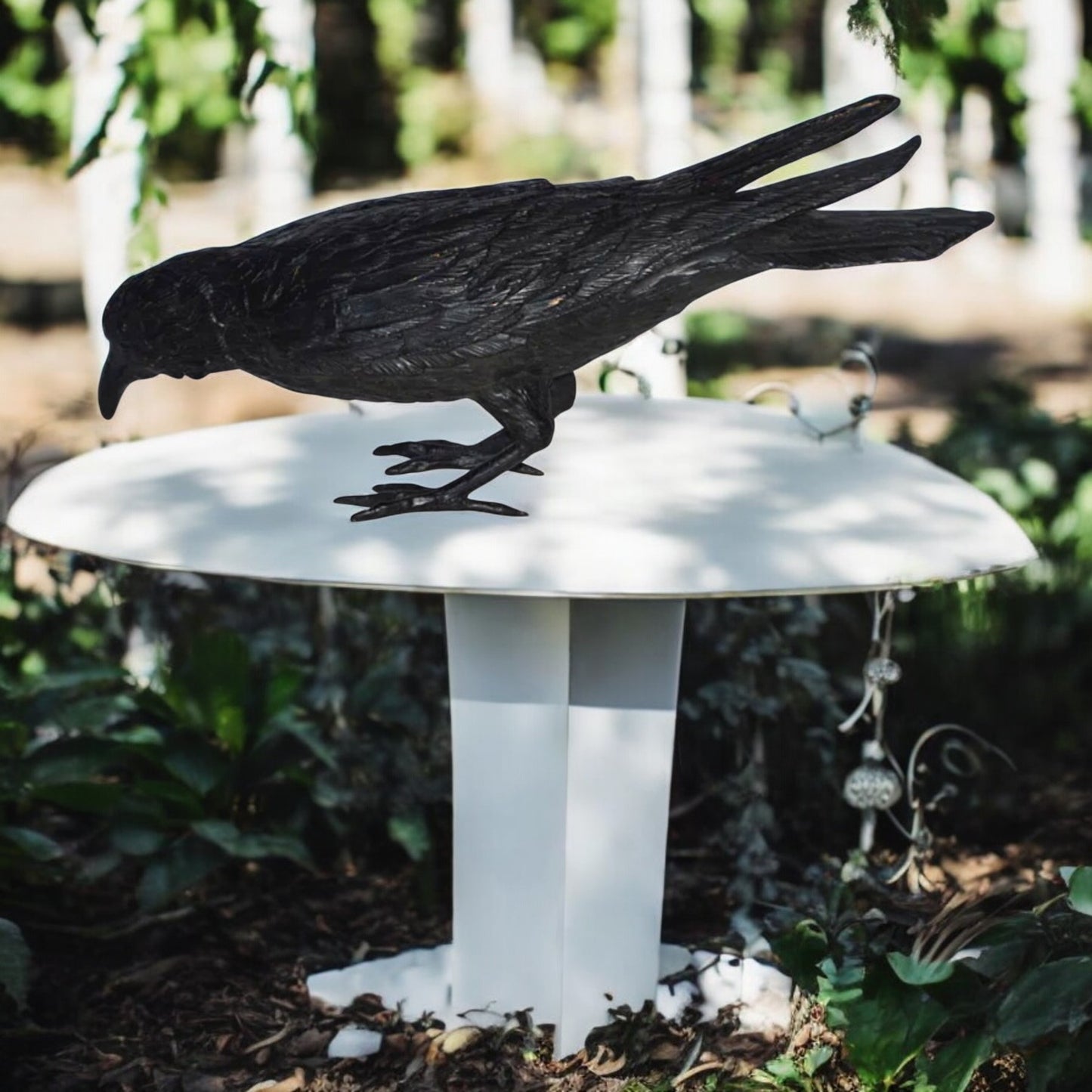 Raven with his head down Bronze Statue - Size: 22"L x 6"W x 11"H.