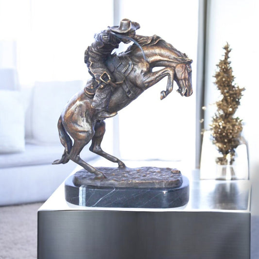 Remington replica Bronco Buster bronze statue - Size: 8"L x 10"W x 12"H.