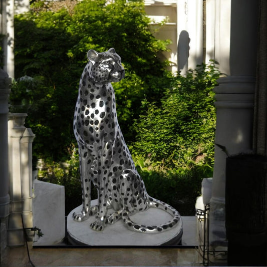 Sitting Cheetah Bronze Statue Silver Finish - Size: 21"L x 21"W x 34"H.