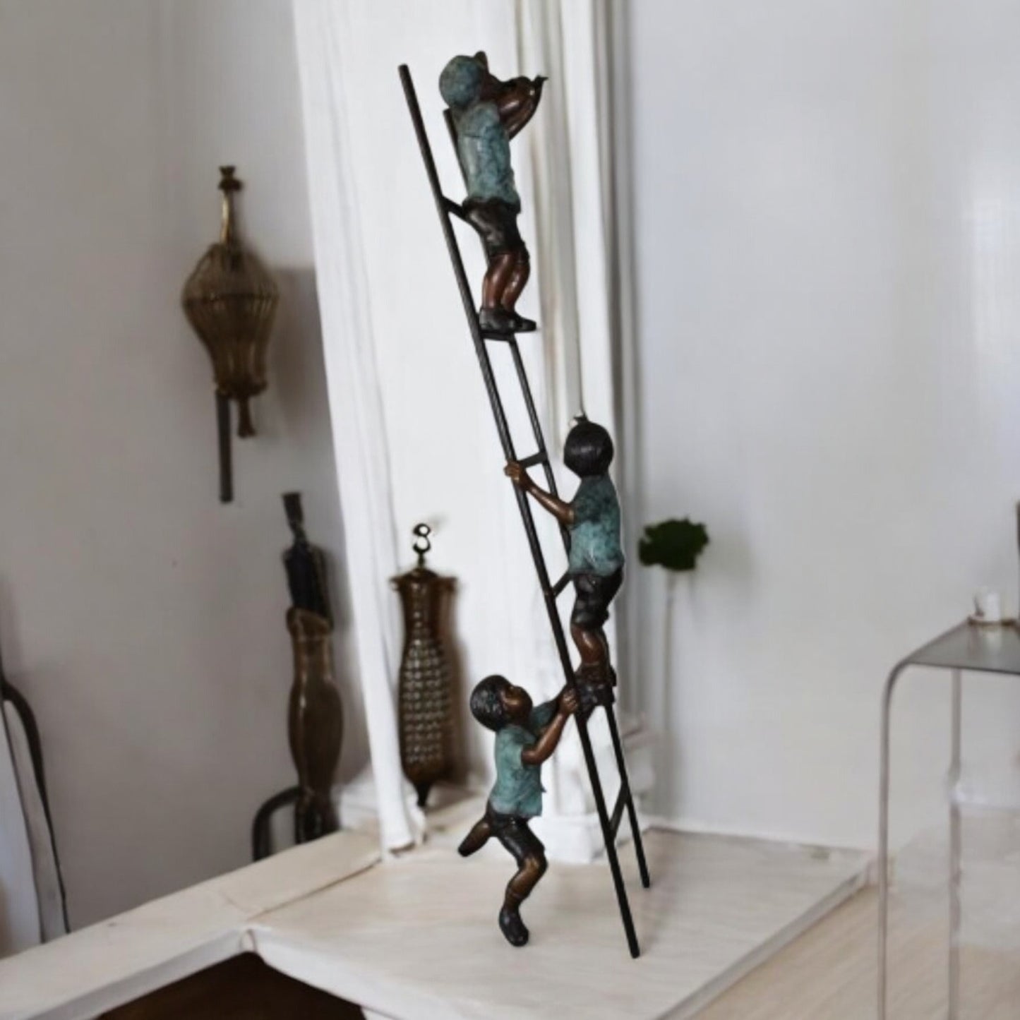 Three kids on a ladder Bronze Statue - Size: 24"L x 22"W x 94"H.