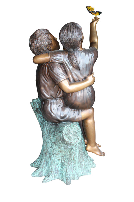 Two Kids Playing with Butterflies Bronze Statue - Size: 30"L x 30"W x 50"H.