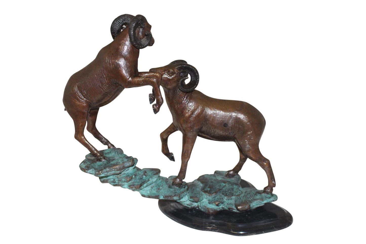 Two Rams on a rock Bronze Statue - Size: 15"L x 8"W x 16"H.