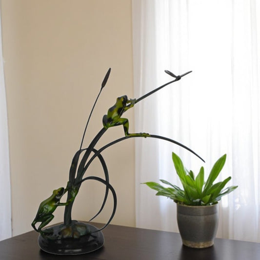 Two Green Frogs catching a dragonfly Bronze Statue - Size: 17"L x 10"W x 13"H.