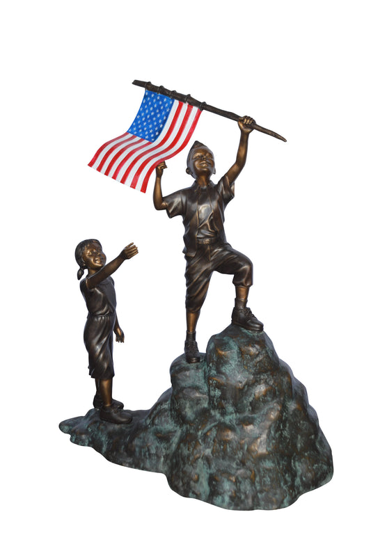 Two Kids on Rock W the American Flag Bronze Statue -  Size: 50"L x 22"W x 58"H.