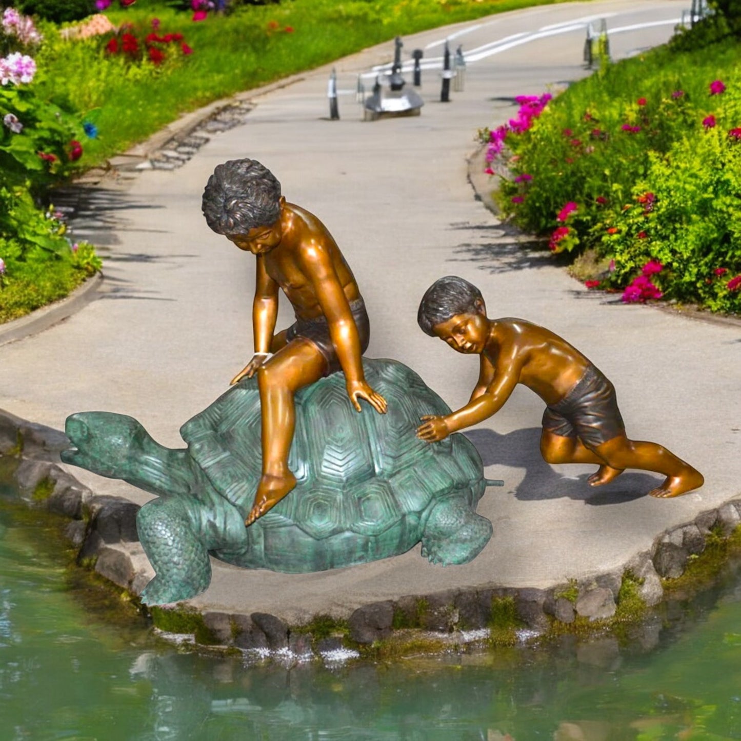 Two Kids on a Giant Turtle Bronze Fountain - Size: 23"L x 60"W x 33"H.
