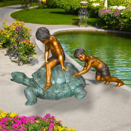 Two Kids on a Giant Turtle Bronze Fountain - Size: 23"L x 60"W x 33"H.