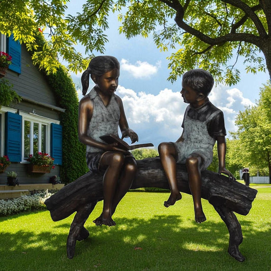 Two Kids on a tree log reading Bronze Statue Large -  Size: 44"L x 17"W x 42"H.