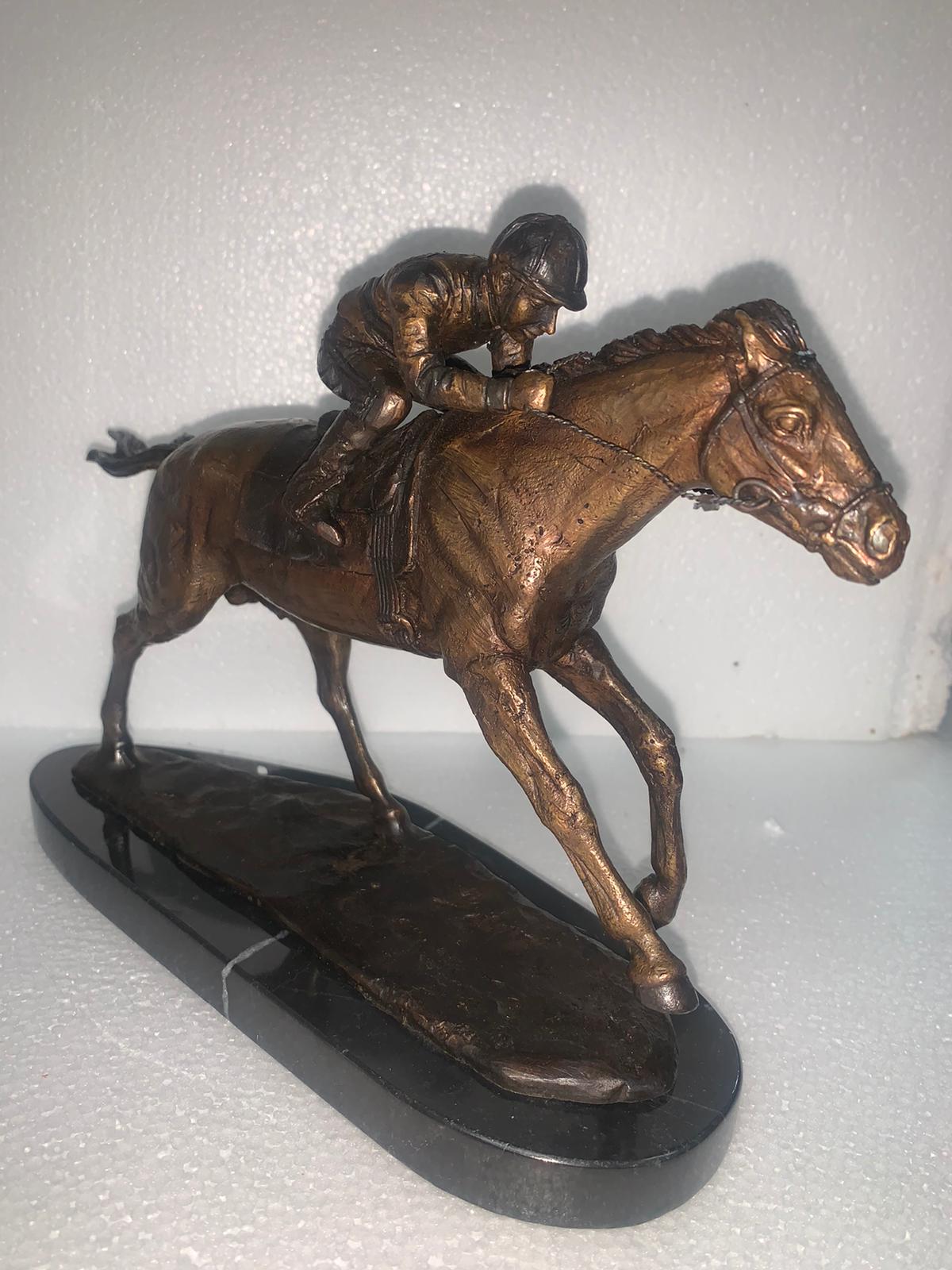 Jockey on horse two tones Bronze Statue -  Size: 11"L x 4"W x 8"H.