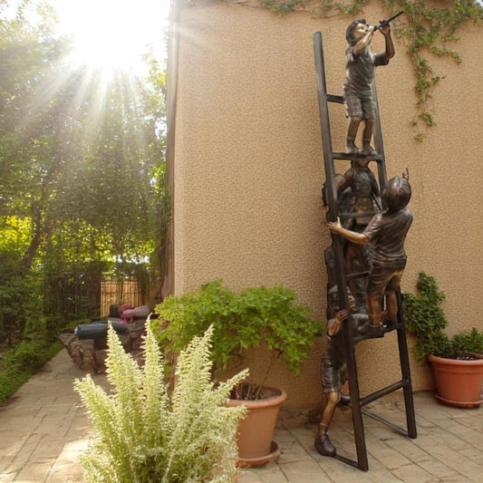 Three Children Playing on Ladder Bronze Statue -  Size: 24"L x 27"W x 96"H.