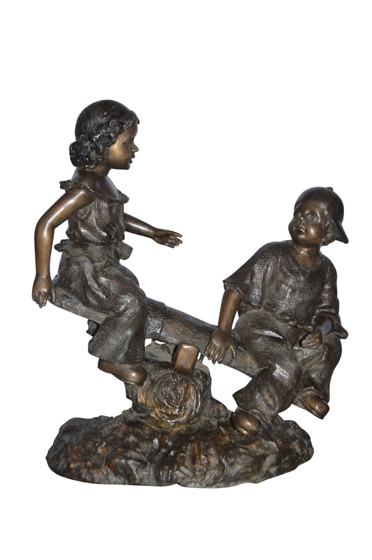 A Boy and a Girl Playing Seesaw Bronze Statue - Size: 17"L x 33"W x 36"H.