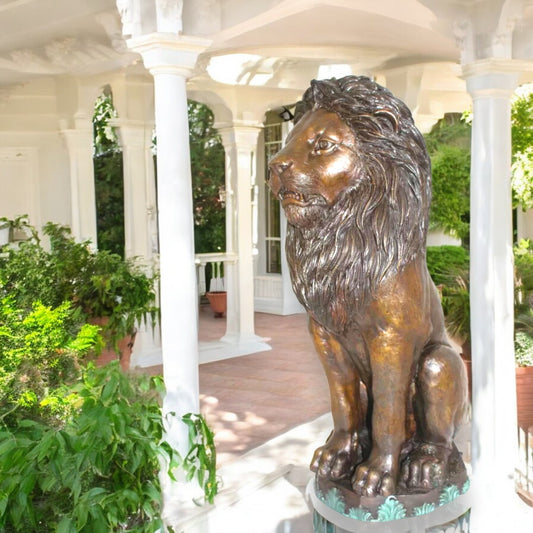 Lion Sitting on Base Bronze Statue - Size: 13"L x 13"W x 34"H.