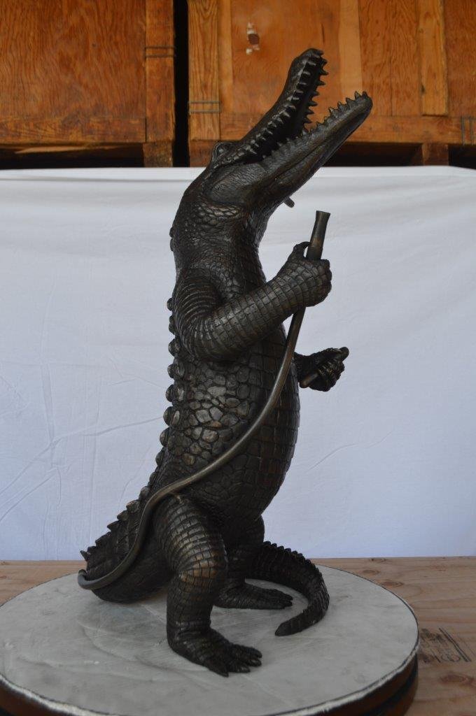 Alligator having fun bronze statue - fountain - Size: 15"L x 15"W x 31"H.