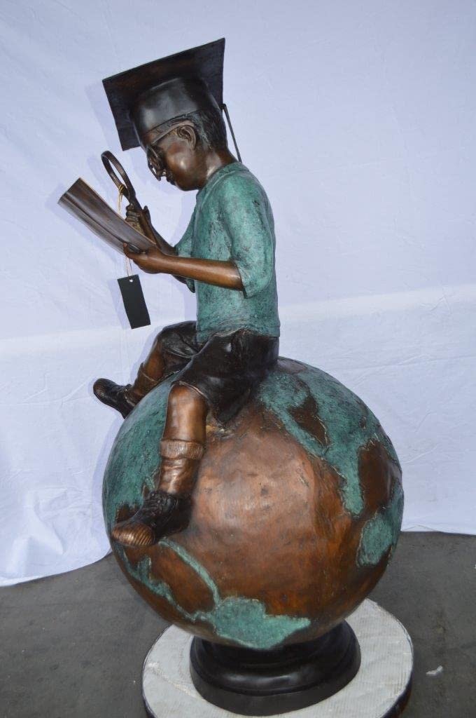 Student learning on top of world bronze statue - Size: 28"L x 24"W x 52"H.