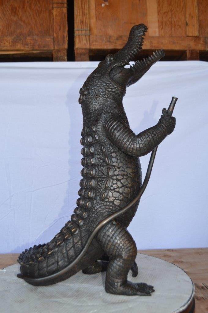 Alligator having fun bronze statue - fountain - Size: 15"L x 15"W x 31"H.