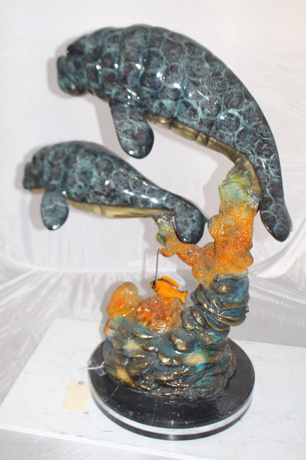 Manatees swimming - large Bronze Statue - Size: 18"L x 28"W x 38"H.