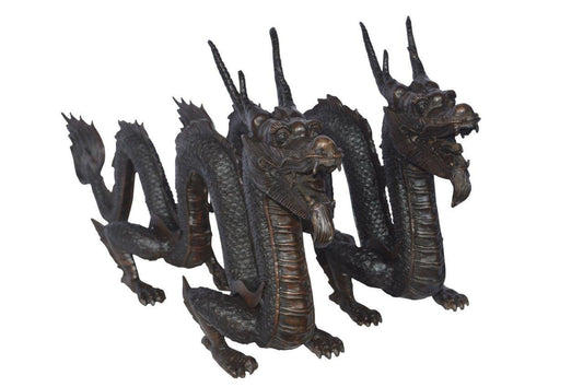 Pair of Dragons sitting side by side bronze statues -  Size: 31"L x 7"W x 16"H.