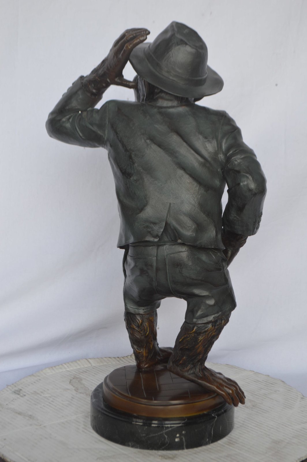 Monkey in Suit bronze statue - Size: 16"L x 10"W x 27"H.