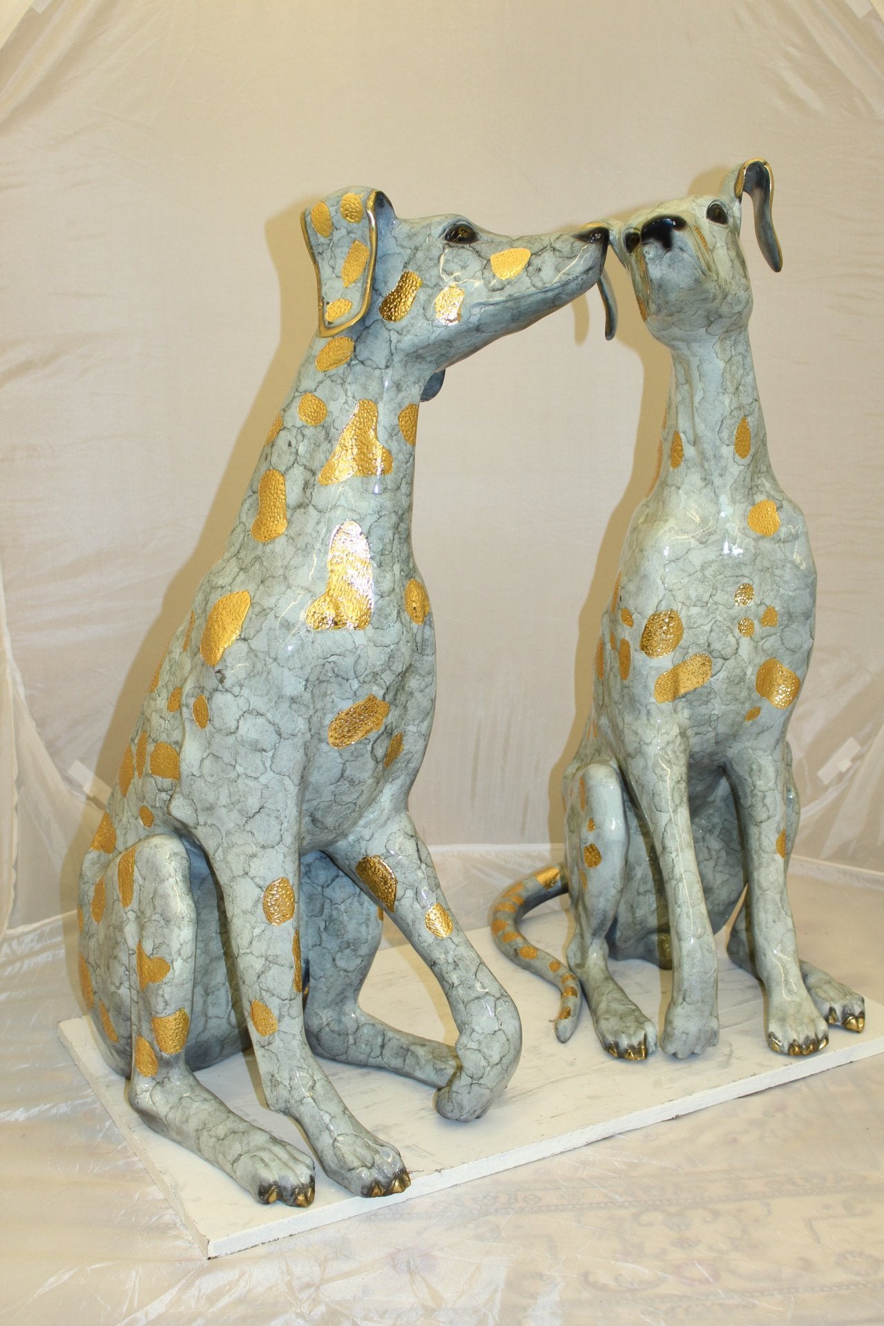 Pair of Golden Pleated Dalmatians Sitting Bronze Statue -  21"L x 16"W x 35"H.