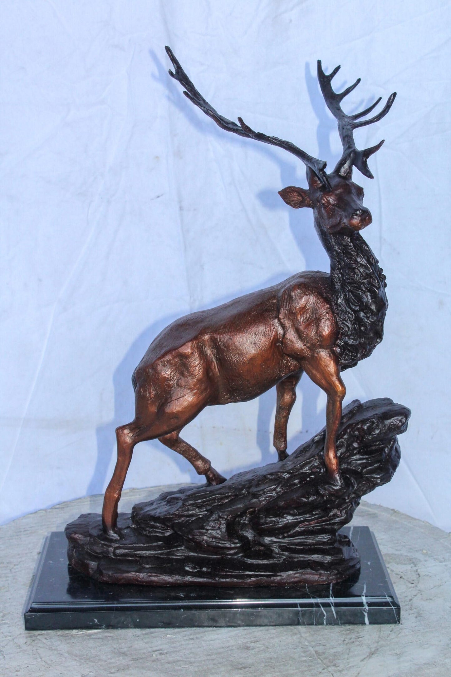 Bronze Statue of Deer Walking on Rocks, Elegant Wildlife Decor 15" x 7" x 21"H