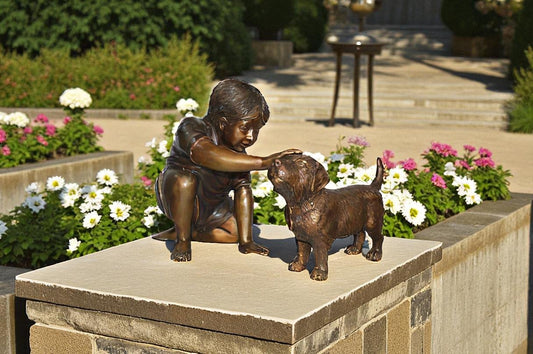 Boy and Dog Bronze Statue - Size: 30"L x 18"W x 18"H.