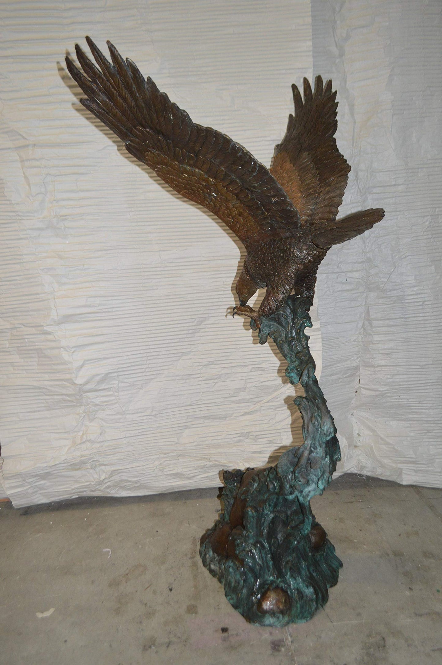 Flying Eagle on Wave Bronze Statue - Size: 25"L x 35"W x 57"H.