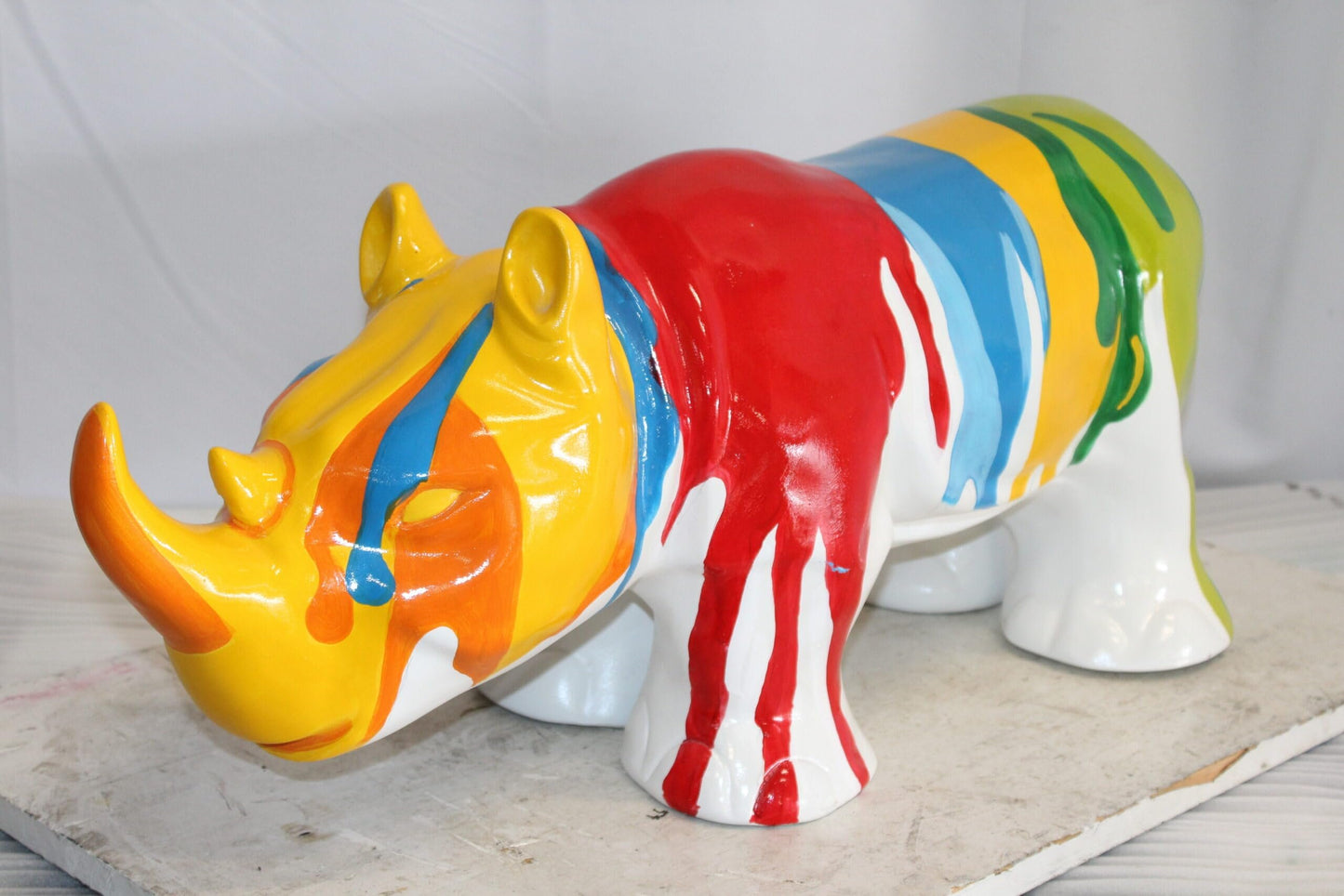 Fiberglass Rhino Statue Dynamic Presence with Paint Droplets 30" x 12" x 12"H