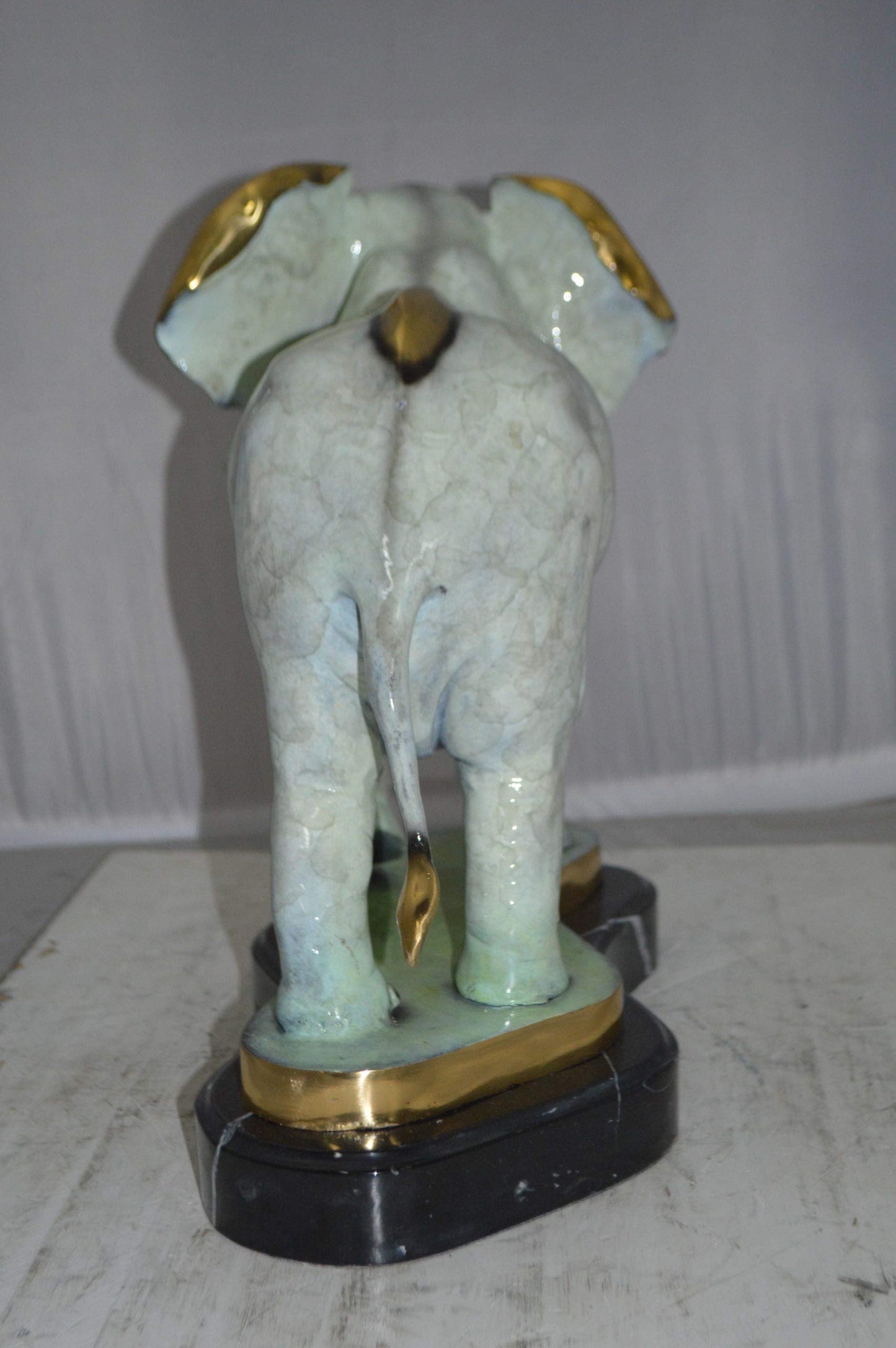 Elephant trunk Down Bronze Statue - Size: 28"L x 12"W x 17"H.