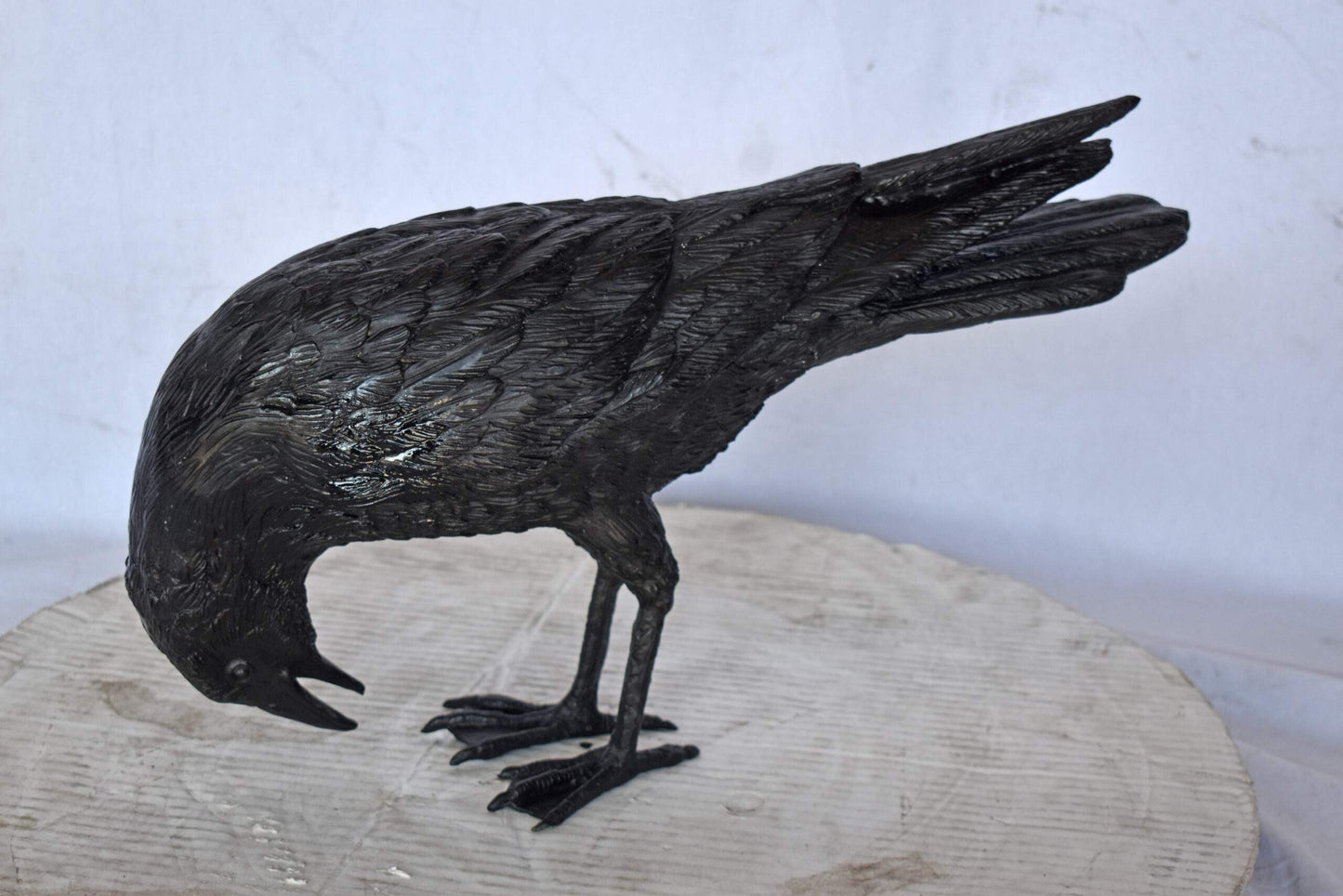 Raven Looking Down Bronze State - Size: 19"L x 5"W x 11"H.