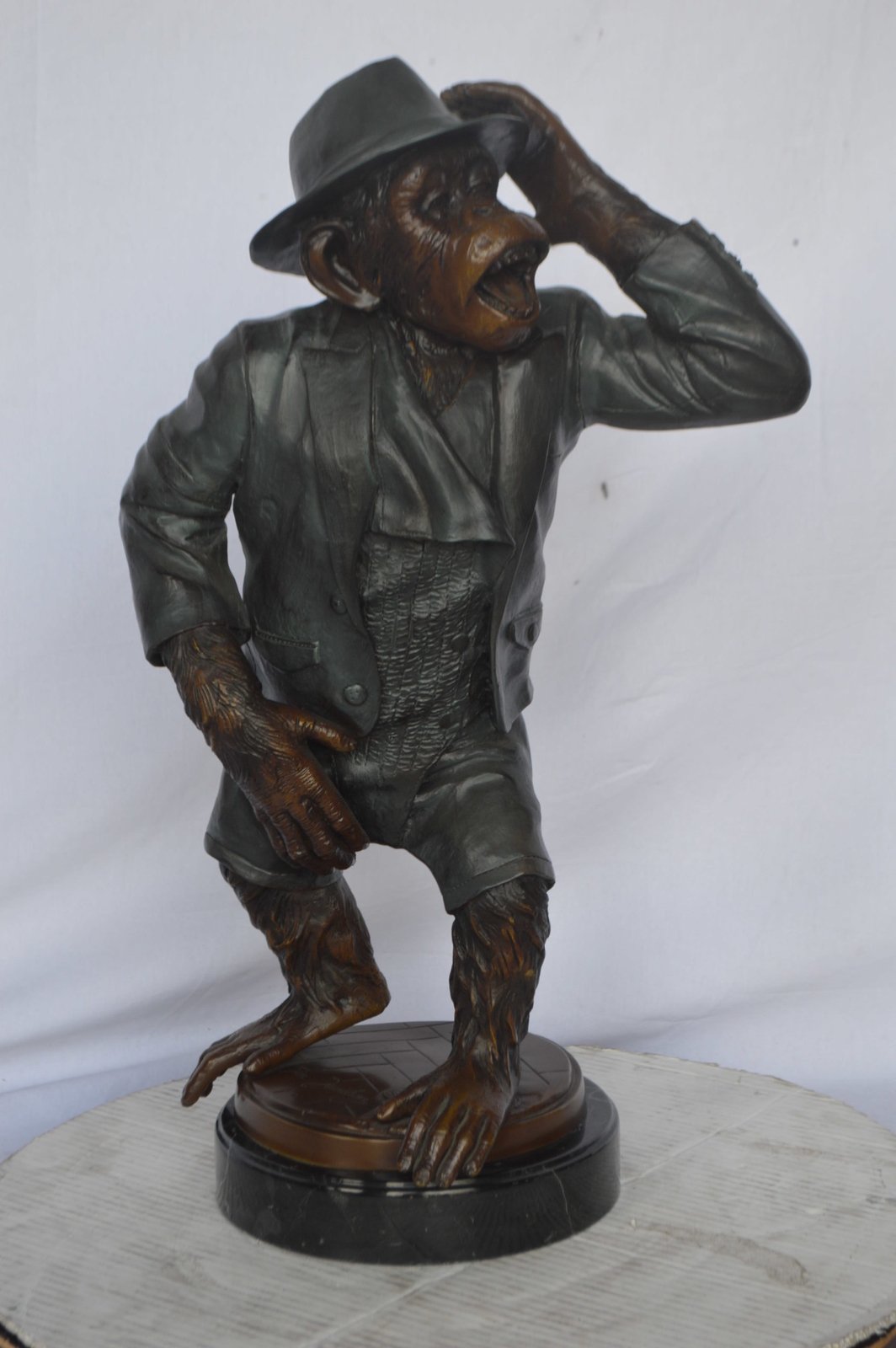 Monkey in Suit bronze statue - Size: 16"L x 10"W x 27"H.