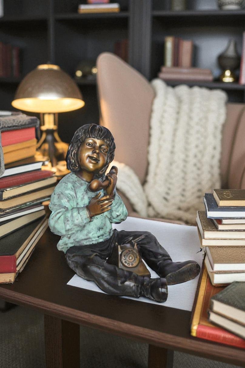 Young Child With an Old Telephone Bronze Statue -  Size: 21"L x 14"W x 19"H.