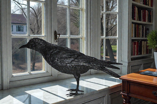 Raven with his head up Bronze Statue - Size: 23"L x 6"W x 13"H.