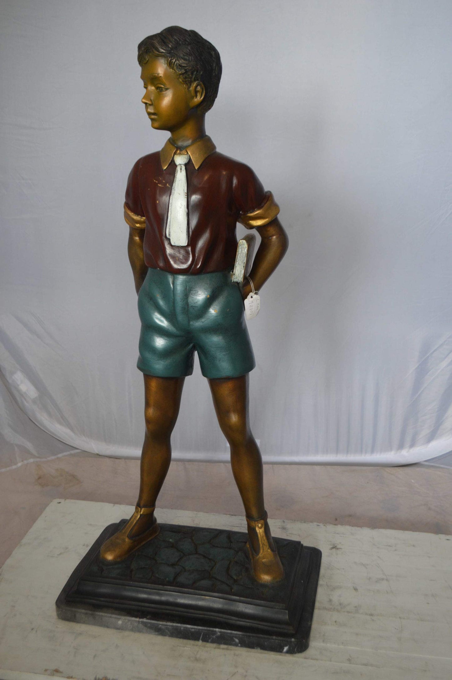 Kid Holding a Book Bronze Statue - Size: 18"L x 11"W x 36"H.
