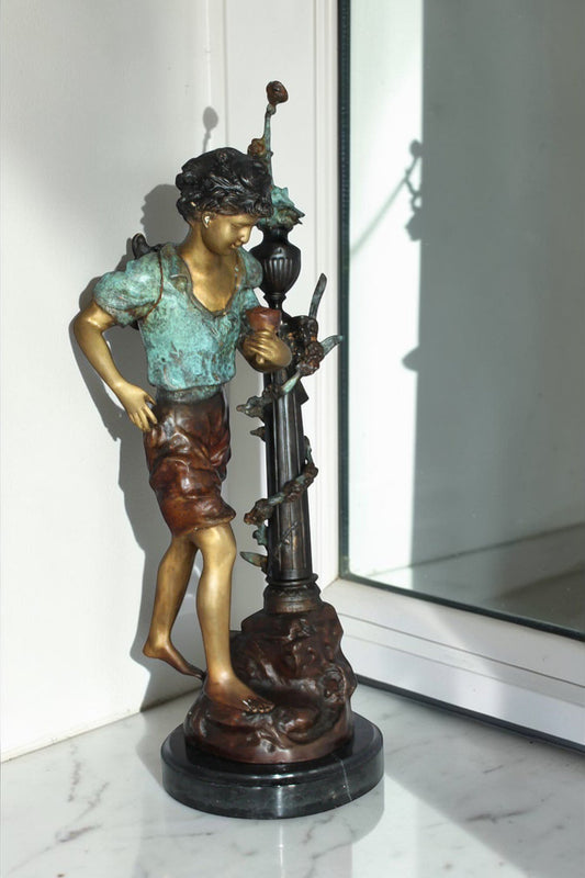 Les Amenes Boy Bronze Statue - Size: 9"L x 8"W x 25"H.
