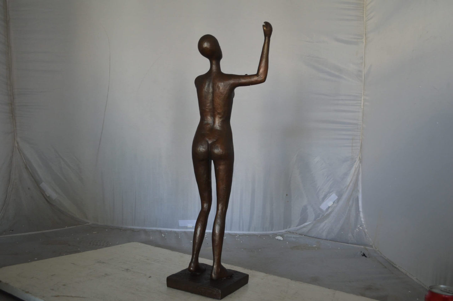 Abstract of Art nude lady lifting hand bronze statue - Size: 9"L x 6"W x 25"H.