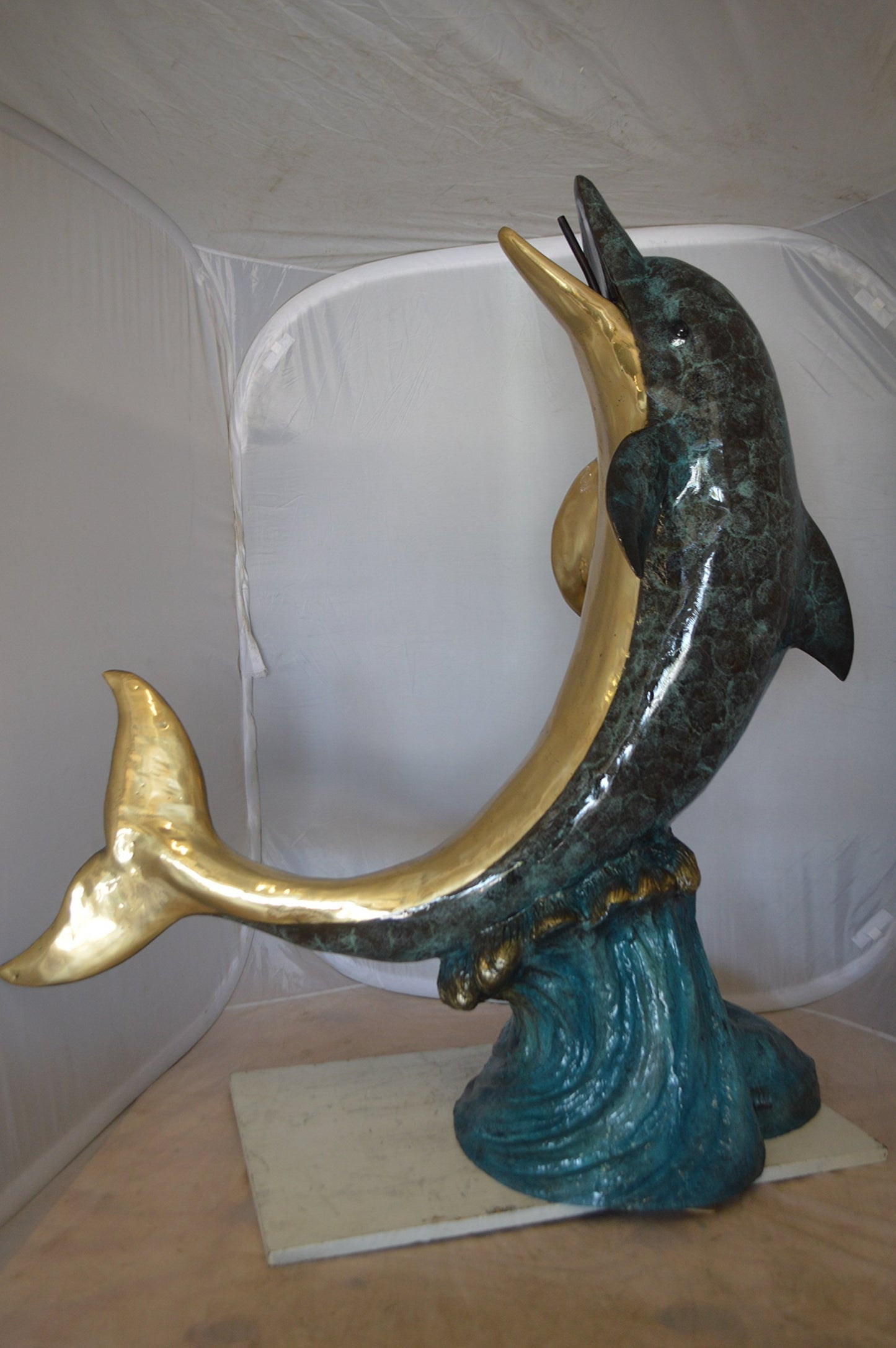Single Dolphin On Wave Fountain Bronze Statue - Size: 48"L x 24"W x 53"H.