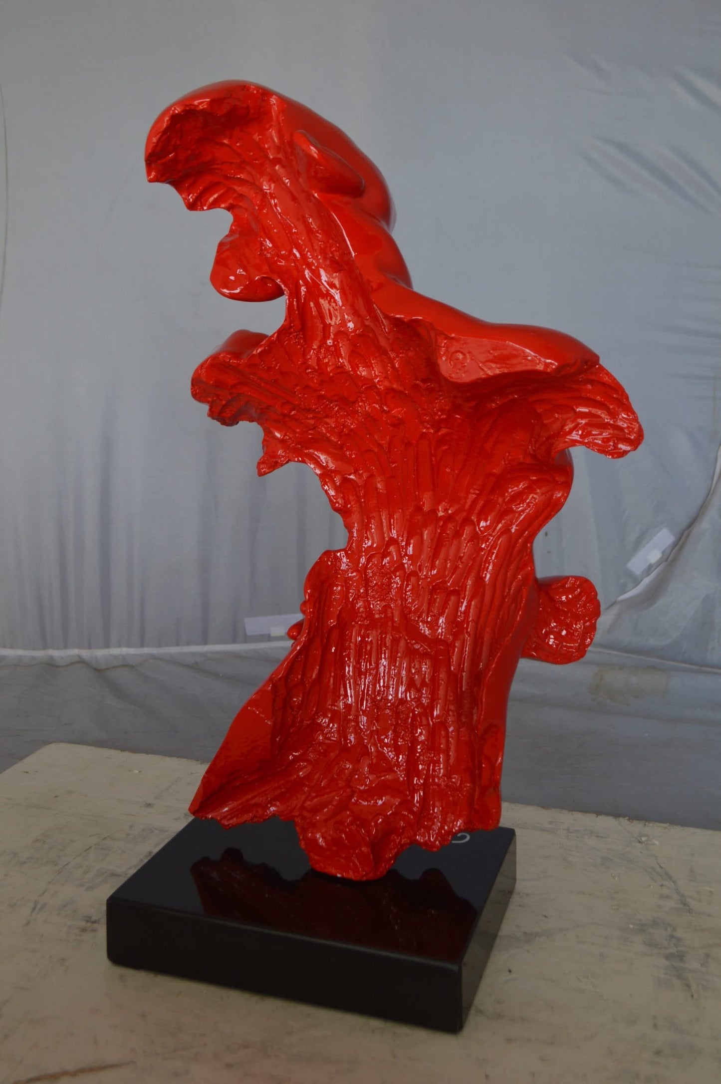 Modern resin statue of a woman hugged by a men - Size: 13"L x 9"W x 24"H.