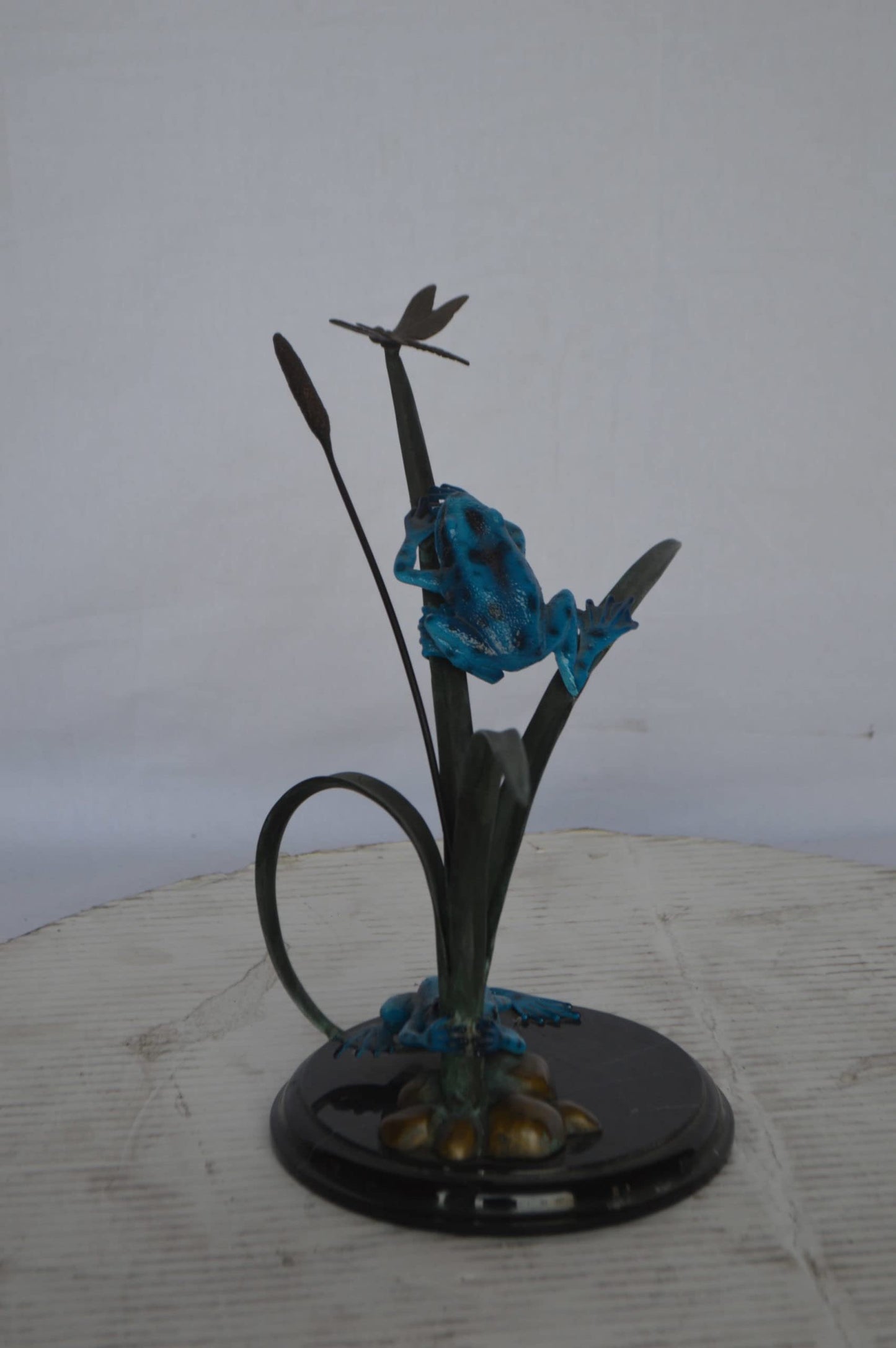 Two Blue Frogs catching a dragonfly Bronze Statue - Size: 14"L x 8"W x 12"H.