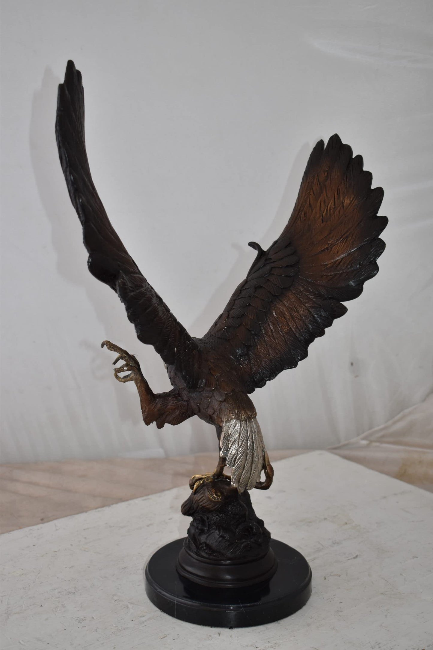 Eagle In Action Trying to Catch His Prey Bronze Statue Size: 17" x 10" x 23"H