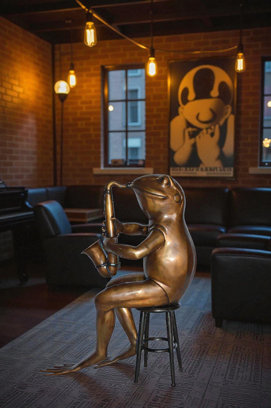 Frog playing saxophone bronze statue - Size: 23"L x 15"W x 30"H.
