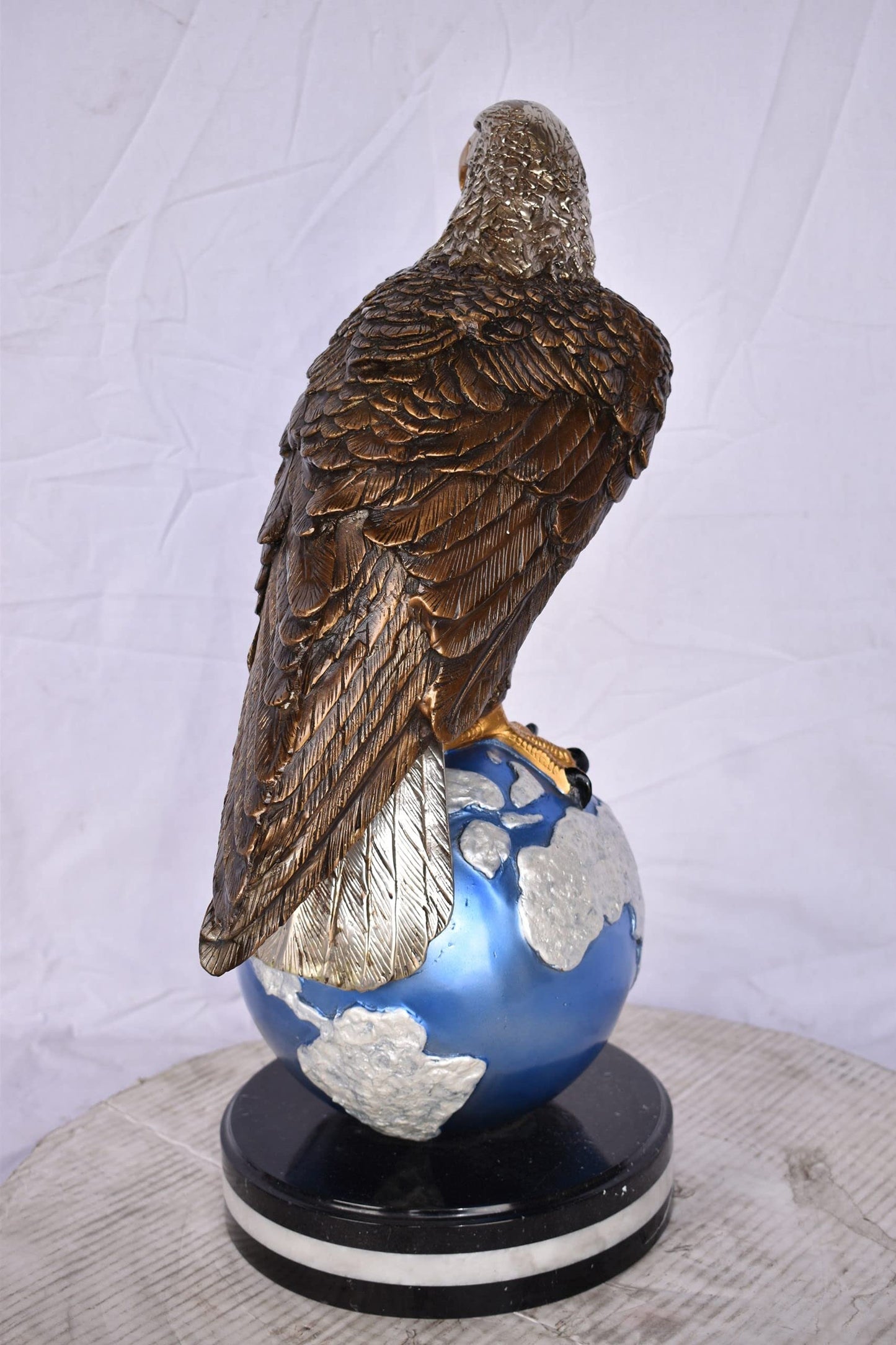 Bald Eagle Standing on a Blue Globe Bronze Statue Size: 17" x 9" x 23"H