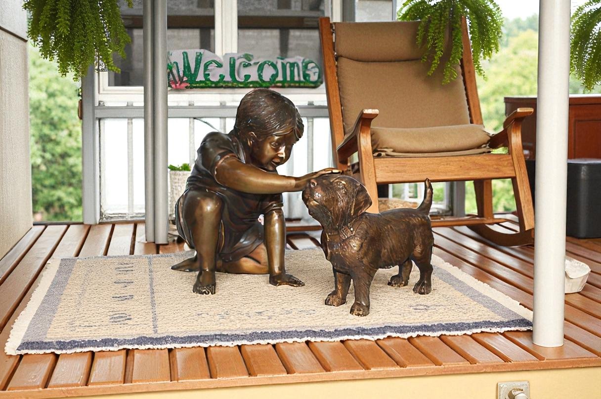 Boy and Dog Bronze Statue - Size: 30"L x 18"W x 18"H.