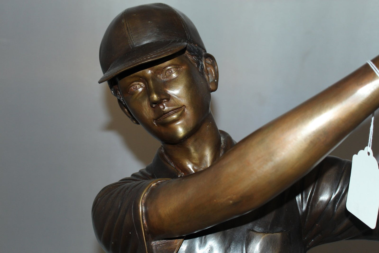 Teen boy plays golf Bronze Statue - Size: 18"L x 13"W x 57"H.