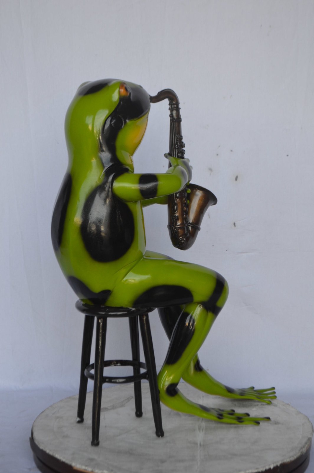 Green frog playing saxophone bronze statue - Size: 23"L x 15"W x 30"H.