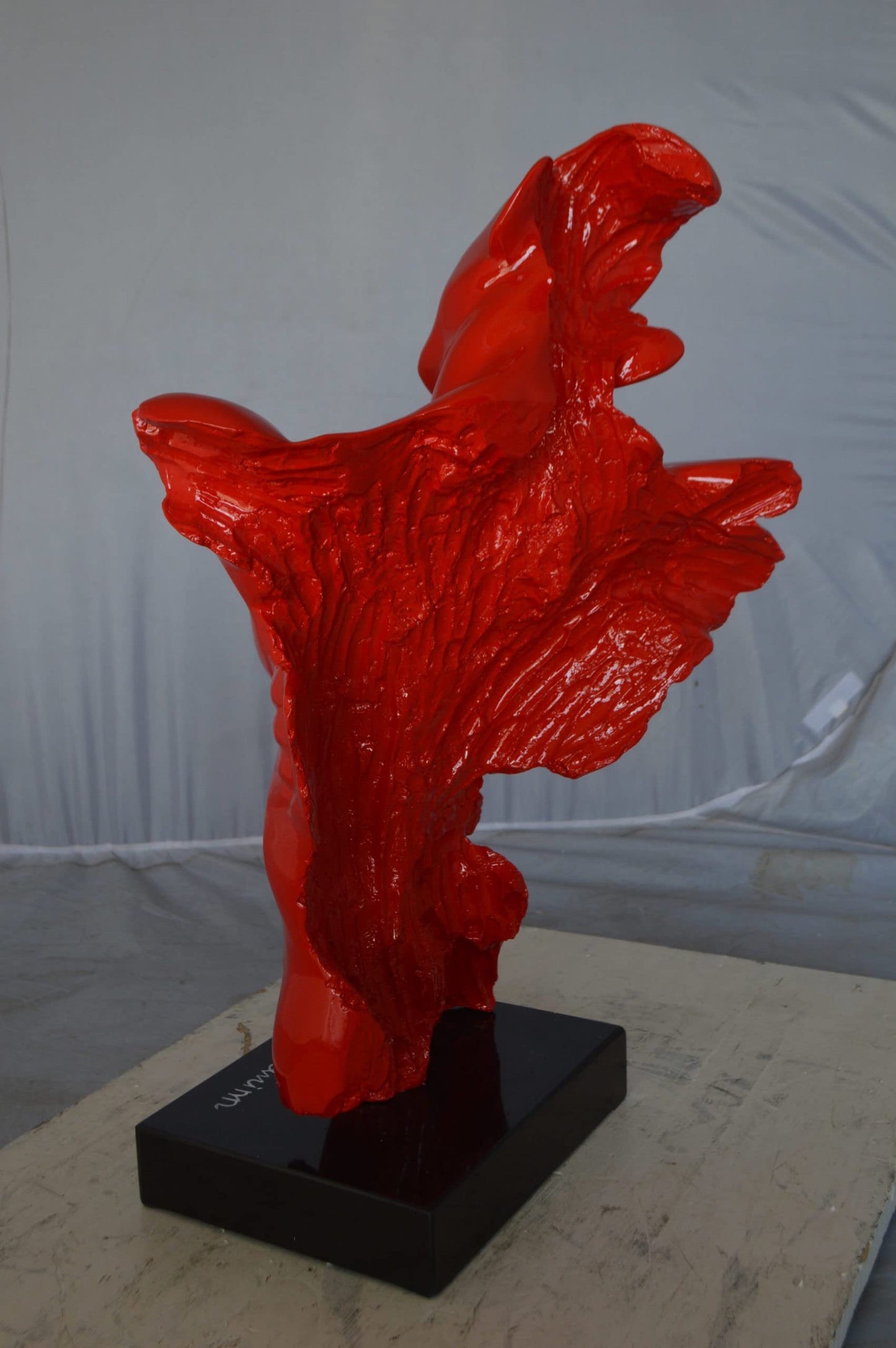 Modern resin statue of a man hugged by a woman - Size: 17"L x 8"W x 24"H.