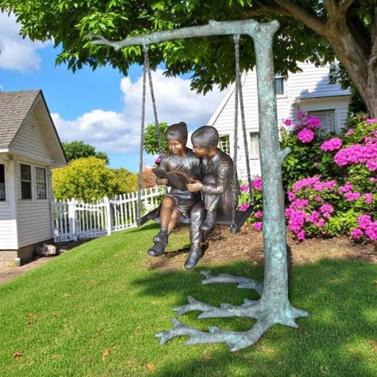 NIFAO Kids on Swing Set Reading a Book Bronze Statue – Rhian Handcrafted Sculpture with Joyful Detail for Gardens, Lawns, or Playful Outdoor Spaces – 50" L x 40" W x 70" H