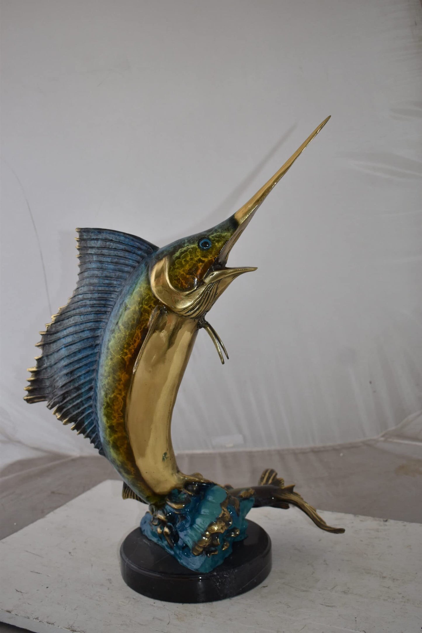 Gold And Blue Sailfish Swimming In Ocean Bronze Statue Size: 18" x 16" x 26"H