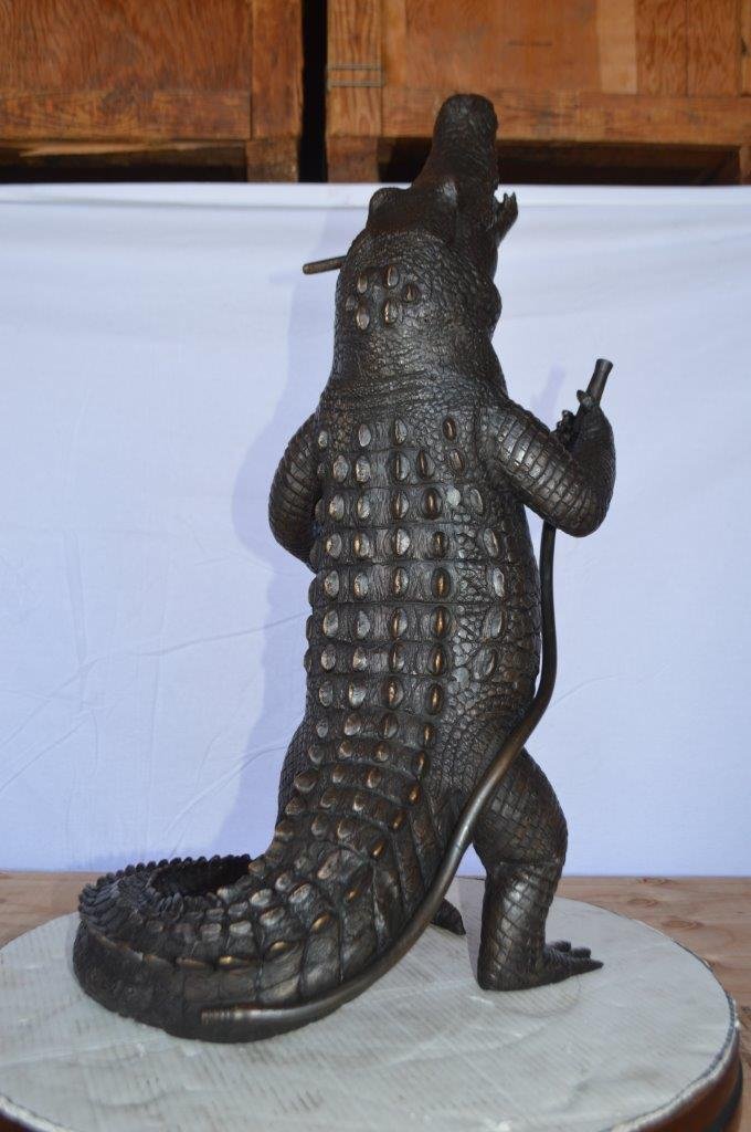 Alligator having fun bronze statue - fountain - Size: 15"L x 15"W x 31"H.