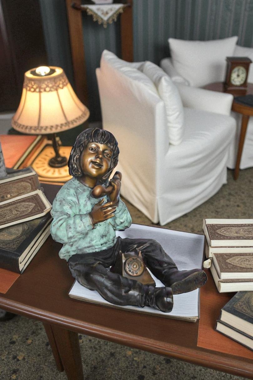 Young Child With an Old Telephone Bronze Statue -  Size: 21"L x 14"W x 19"H.