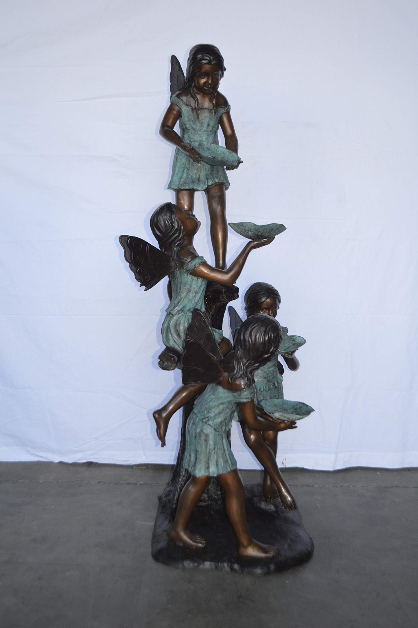 Four Angels Playing Bronze Statue Fountain - Size: 35"L x 28"W x 66"H.